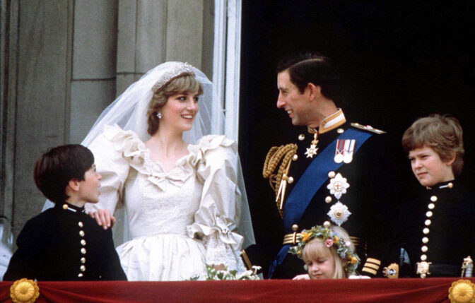 Prince Charles kisses his new bride Diana on their wedding day