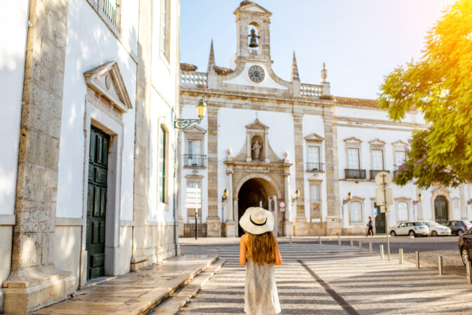 Woman traveling in Faro town on the south of Portugal