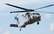 Bruņoto spēku helikopters "Black Hawk" veic treniņlidojumu virs Juglas