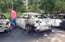 FOTO: nenoskaidrotos apstākļos Zolitūdē sadeg ekskluzīvi BMW auto