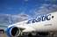 FOTO: Rīgā nolaidusies pirmā Bombardier CS300 lidmašīna
