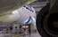 Video un foto: skaties, kā naktī jaunajai "Bombardier" CS300 lidmašīnai veica apkopi