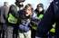 Fotoreportāža: policija aiztur 16. marta provokatoru