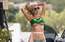Foto: "Playboy" modele izrādās knapā krekliņā un biksēs bez stakles