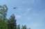 Kandavas meža ugunsgrēka dzēšanas darbos iesaistīts helikopters