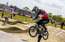 Četri Latvijas BMX riteņbraucēji aizkļūst līdz superkrosa PK posma astotdaļfinālam